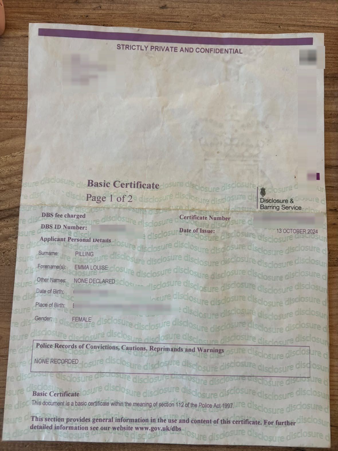 DBS Basic Certificate for Emma showing no police records of convictions, cautions, reprimands or warnings