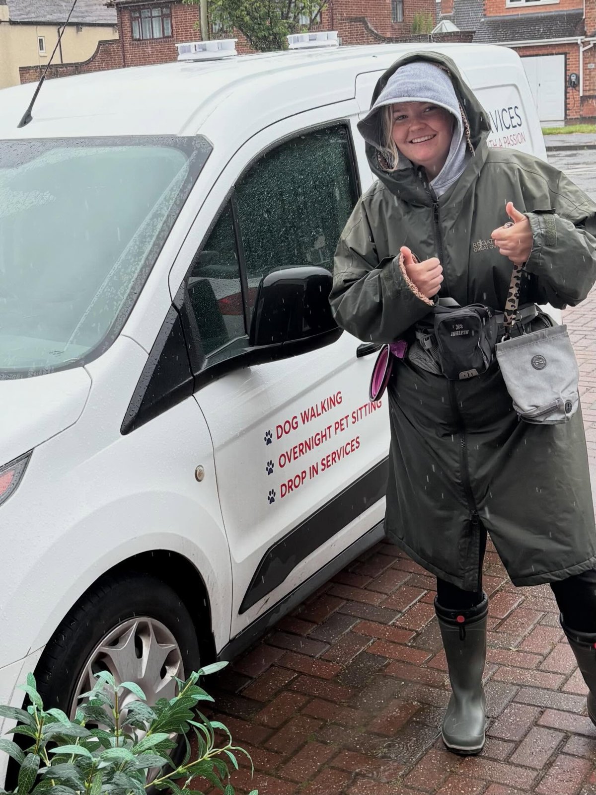 Emma of EPs Pet Services, ready for the round in all weathers beside her branded van